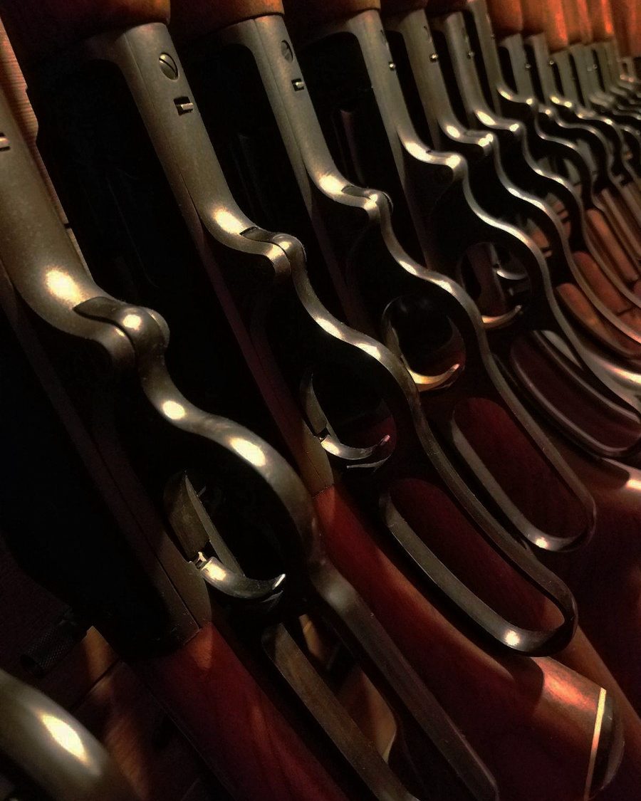 Rack of lever-action rifles at Cross Arms